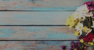 bouquet of flowers on a wooden table 300x159 - bouquet-of-flowers-on-a-wooden-table